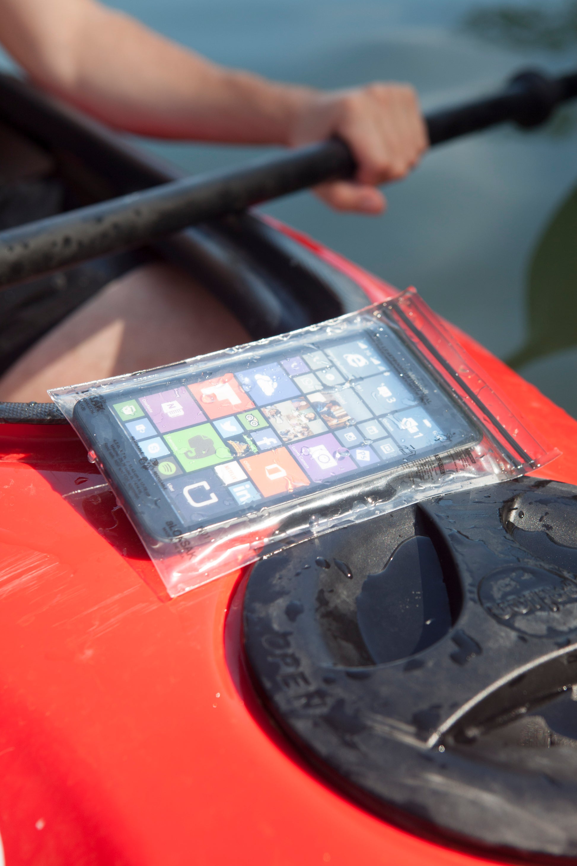 aLOKSAK Waterproof Phone Bag in Use on Kayak – Element Proof | LOKSAK